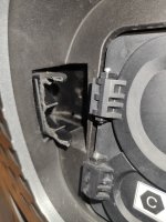 broken hinge part on the car.jpeg