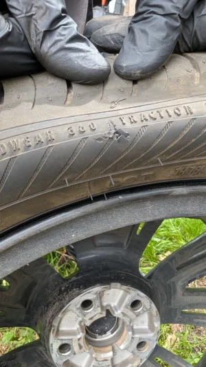 Pothole vs new tyre.webp