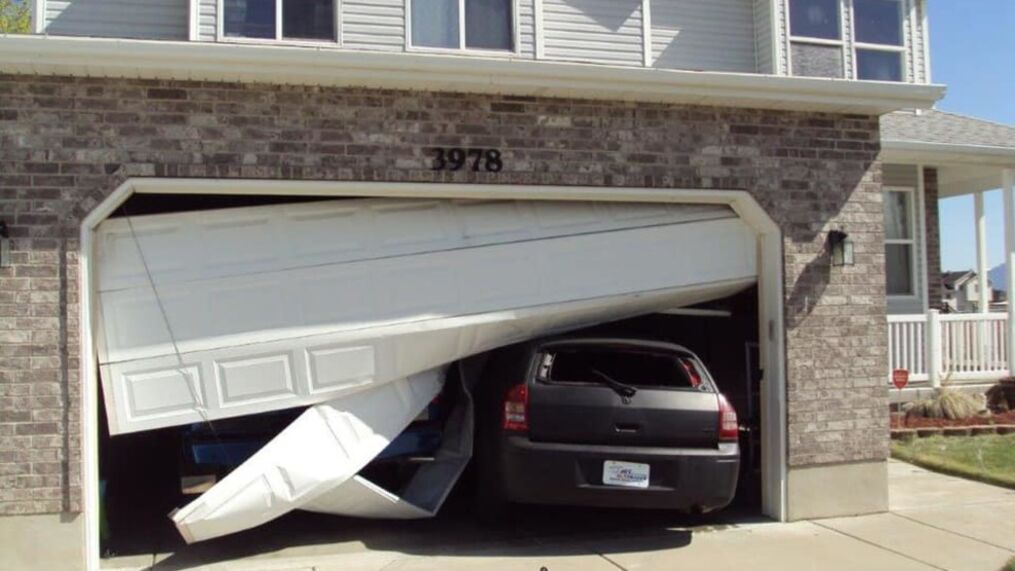 ran-into-garage-door-with-car.jpg
