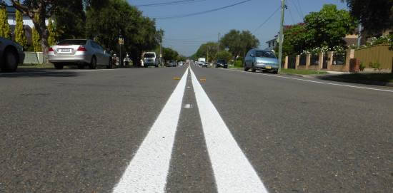 6457aad5f52e17995592484d_double-white-line-straight-road-1.jpg